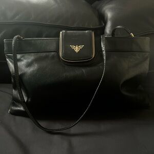 Chic Black Leather Shoulder Bag with Gold Accent